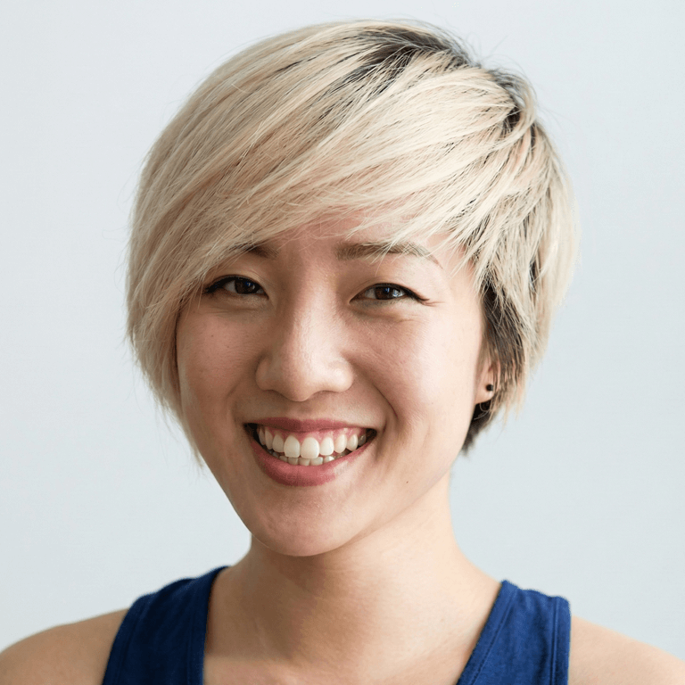 Two team members smiling